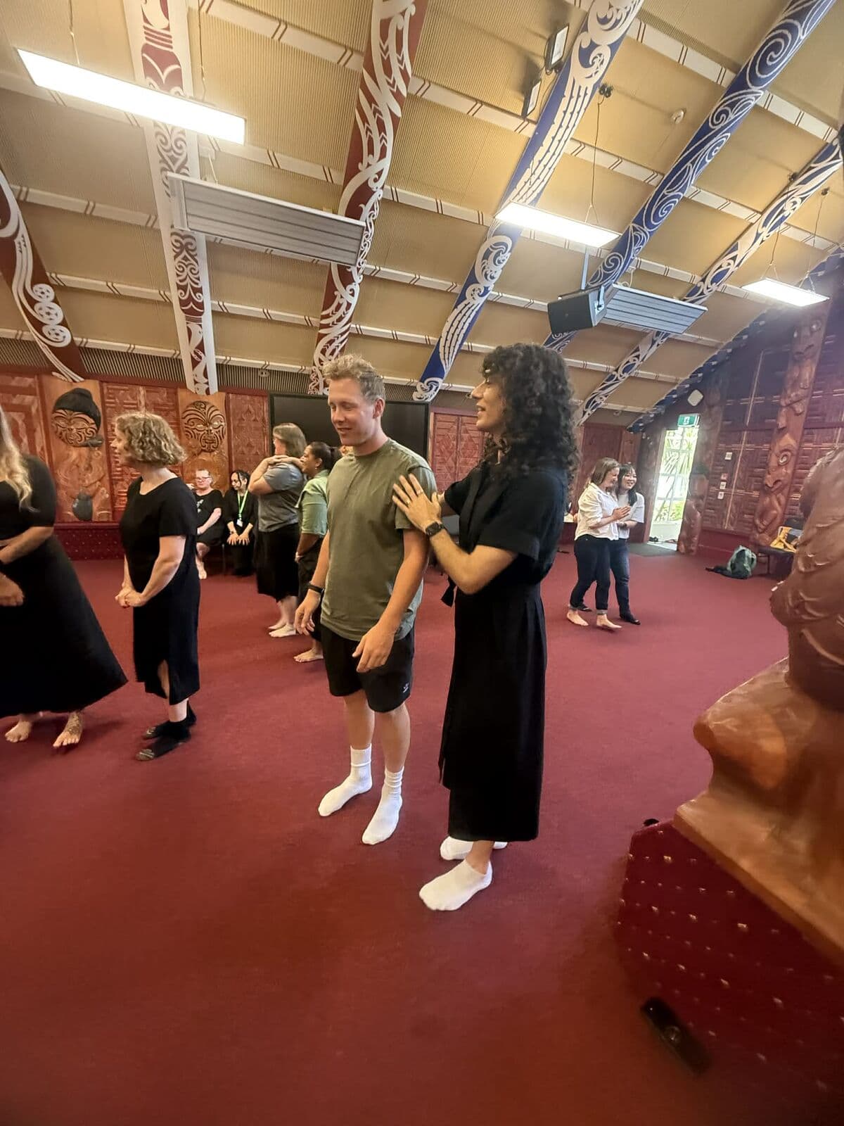 Two participants connecting during a wānanga exercise